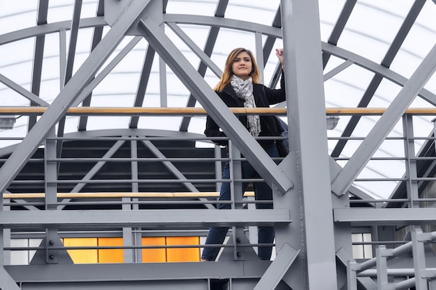 young-woman-urban-structures-covered-overpass_533998-5248-1